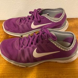 Womens Nike athletic shoes, purple, 7.5